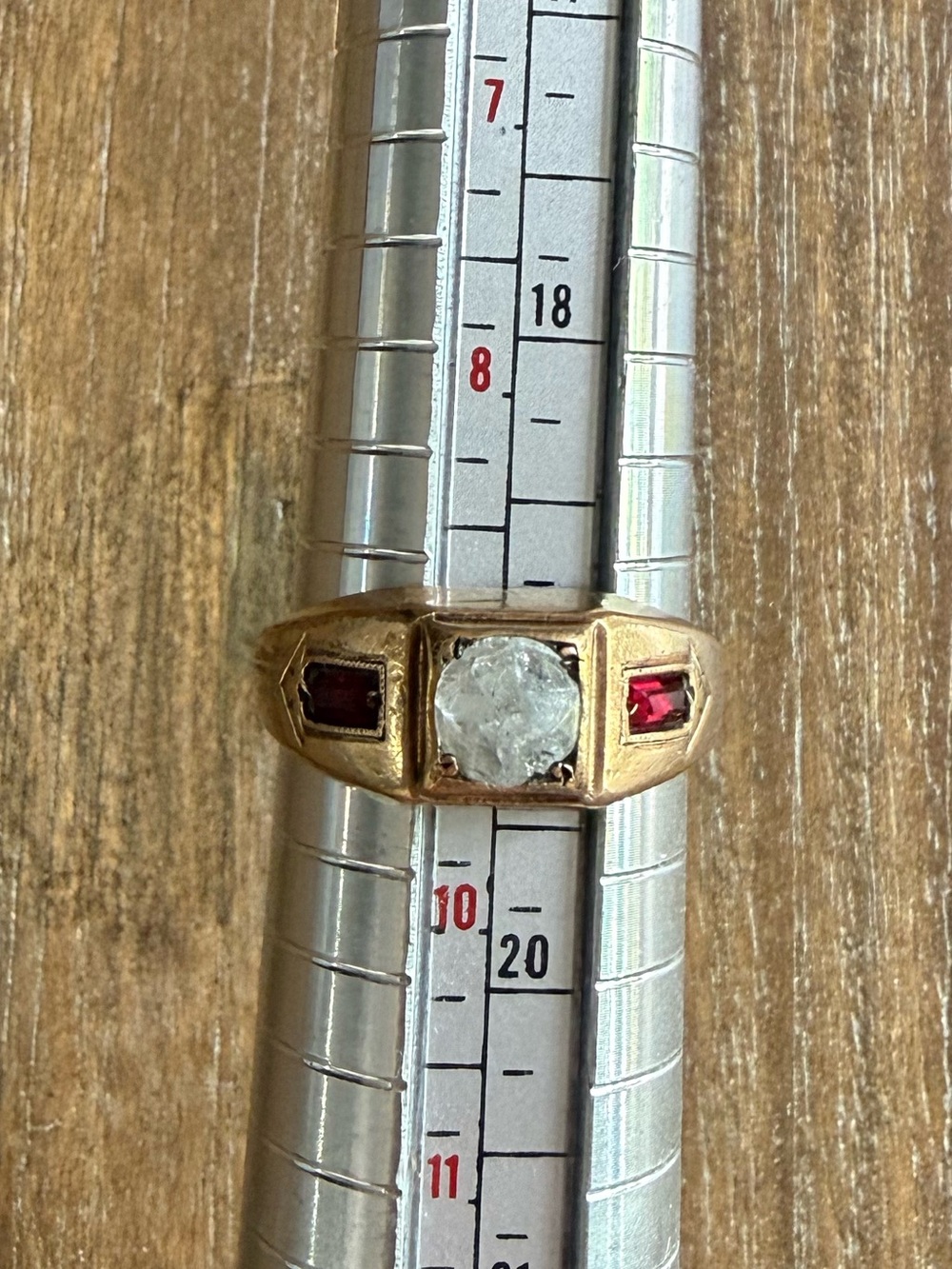 Black Hills Gold gold plated sz 9 ring with cubic zirconia and red accent stones